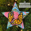 A 3D peyote star with monarch butterflies displayed on a Christmas tree