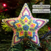 A small beaded star ornament in pastel colors displayed on a Christmas tree