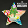 Beach beaded star ornament on black background