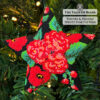 Beaded star ornament with red poppies and pink peonies on a Christmas tree