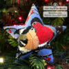 Beaded peyote star ornament with two bullfinches sitting on snowy branches