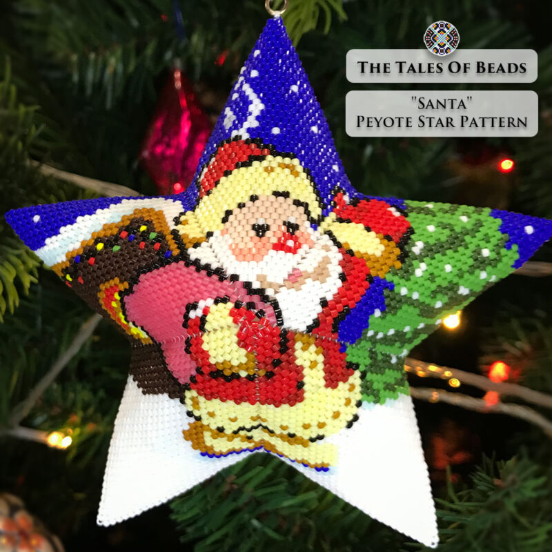 beaded star ornament with Santa leaving a cabin decorated with festive lights hanging on a Christmas tree