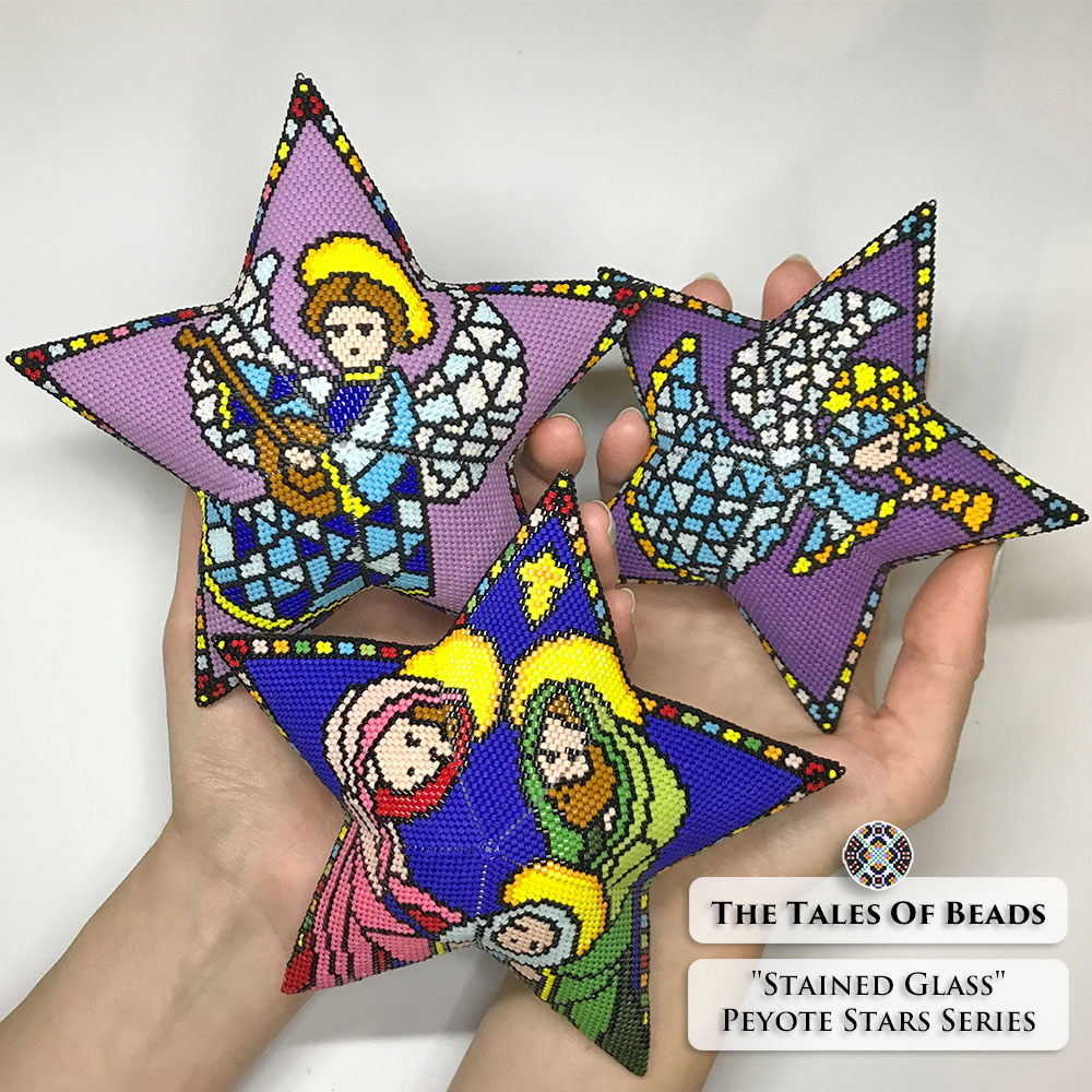 Beaded stars with Christian designs held in hands for scale