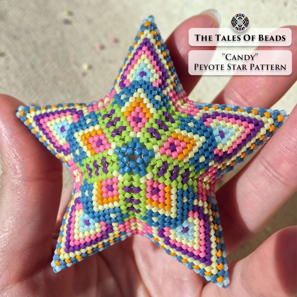 The Candy beaded star ornament held in hand