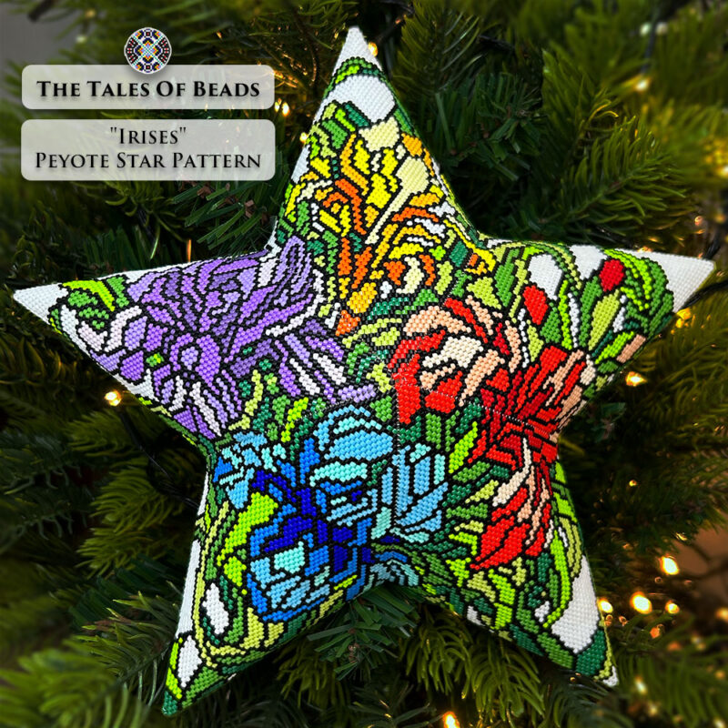 a huge beaded star ornament with colorful iris flowers hanging on a Christmas tree
