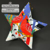 Cardinals beaded star ornament on black background