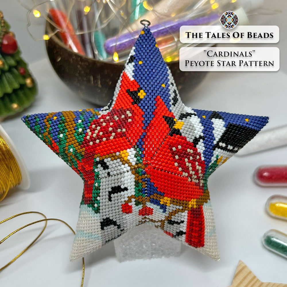 Flat lay of the finished Cardinals Peyote Star with bead tubes and Christmas decor