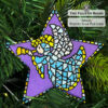 Angel-themed beaded star ornament on Christmas tree background