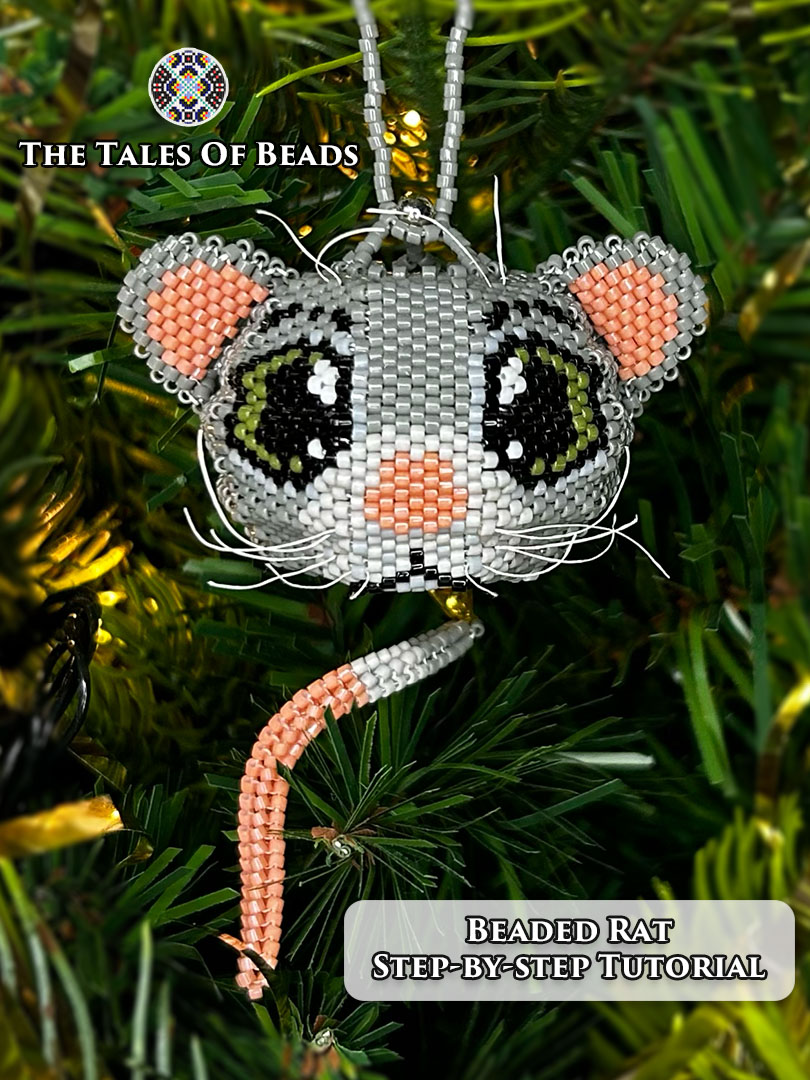 Vertical image of a seed bead rat ornament on a Christmas tree
