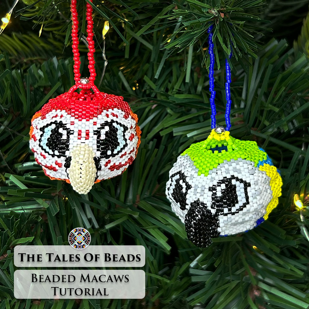 Colorful tropical parrot ornaments made with Miyuki Delica beads displayed on a Christmas tree