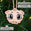 Pig seed bead animal hanging on a Christmas tree