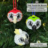 Macaws and Cockatoo seed bead birds side-by-side on a Christmas tree