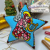Beaded star ornament featuring an angel with materials