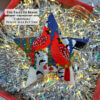 Christmas beaded star ornament withe red cardinals displayed in a red gift box