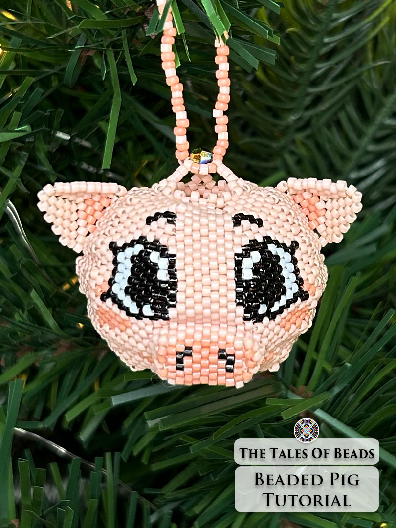 Vertical image of a seed bead pig used as Christmas ornament