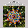 A finished Funfair 2-Drop Peyote Star displayed on Christmas tree