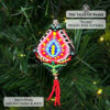 Close-up of the Tulips beaded pod ornament on a Christmas tree