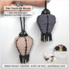 Two beaded hot air balloon lanterns made with Miyuki Delica seed beads held in hand