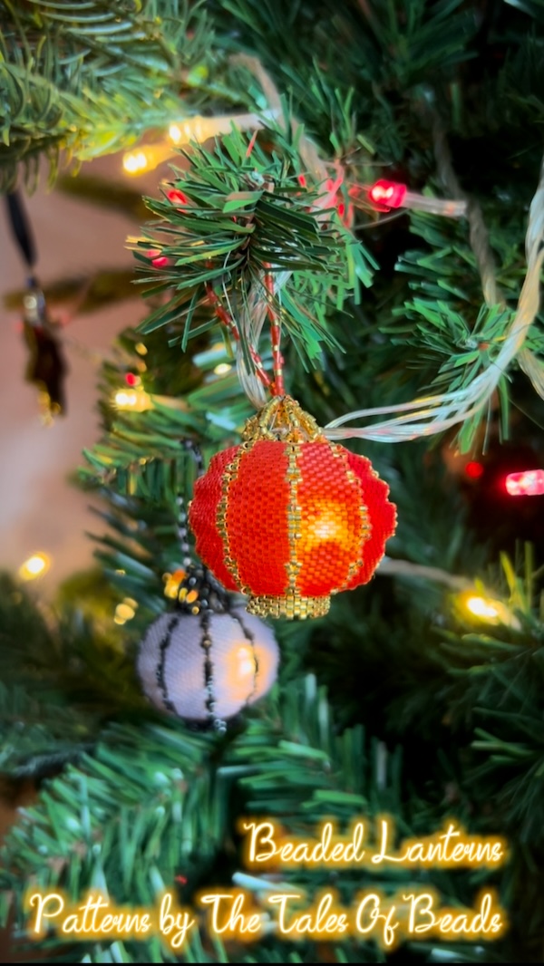 round beaded lantern ornaments glowing on a Christmas tree
