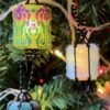 colorful beaded lanterns glowing on a Christmas tree