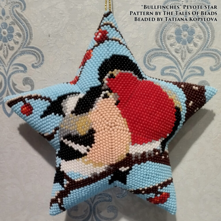 A peyote star featuring a charming bullfinches duo