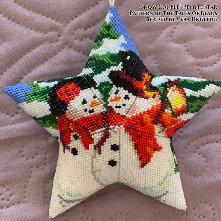 A peyote star featuring a charming snowman duo