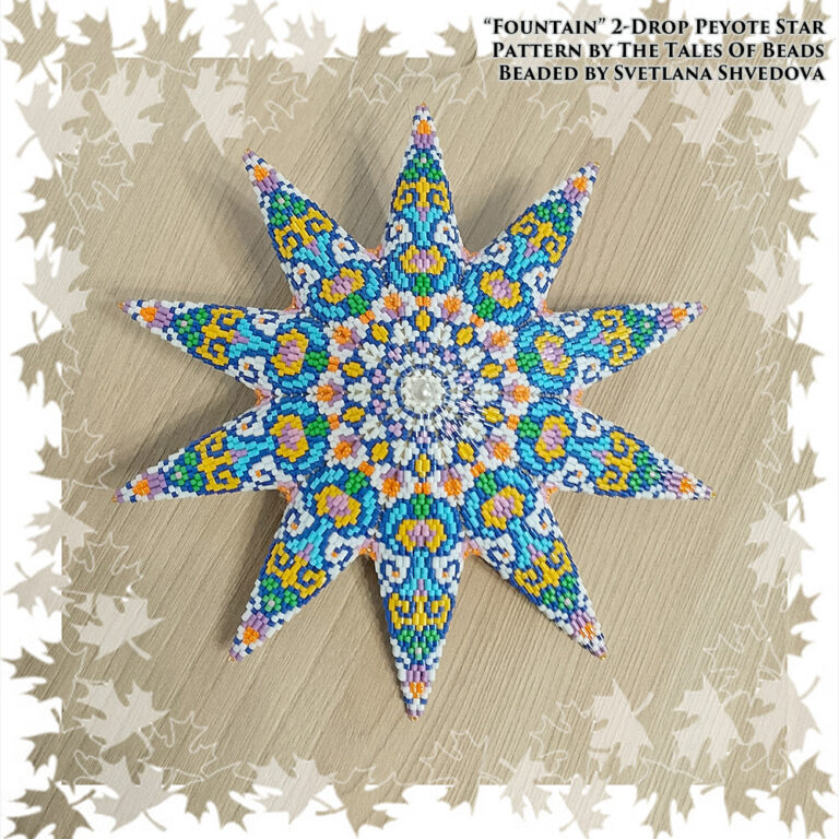 2-drop peyote star with an oriental motif in shades of blue, white and yellow