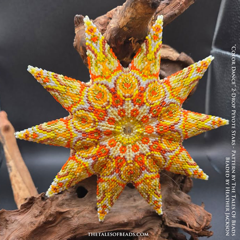 Handcrafted yellow peyote star on a natural branch display
