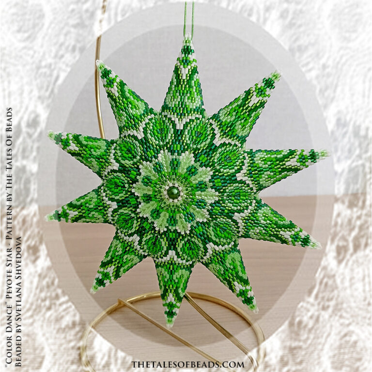 St Patrick's Day Beaded Ornament - Ten point peyote star in shades of green showcased on a gold display stand