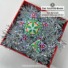 A set of matching peyote stitch ornaments with an elegant floral pattern showcased in a gift box