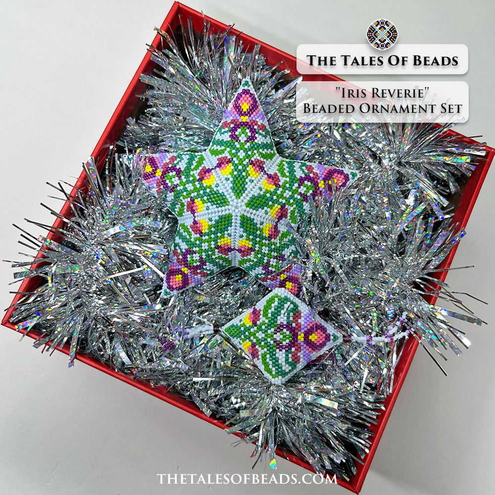 A set of matching peyote stitch ornaments with an elegant floral pattern showcased in a gift box