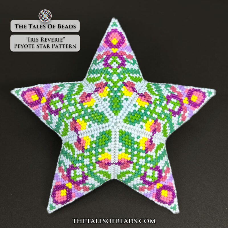 Beaded star ornament with a floral motif showcased on black background