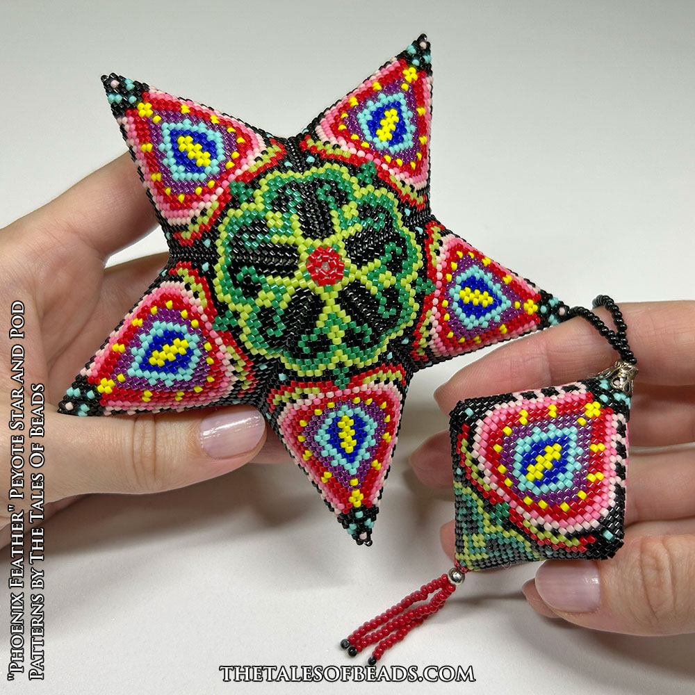 A set of matching peyote stitch ornaments with a vibrant floral pattern held in hands