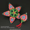 A set of matching peyote stitch ornaments with a striking floral design showcased on black background