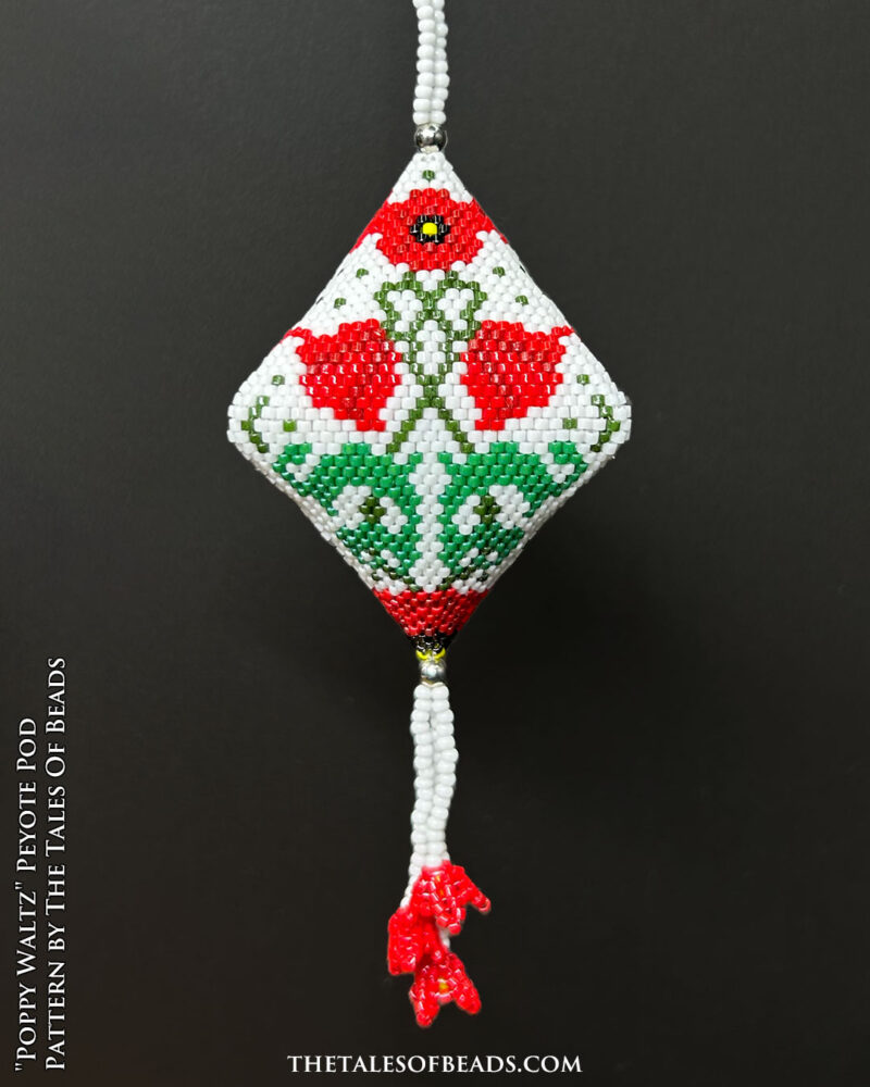 peyote-pod-beading-patterns-poppy A peyote pod with an elegant poppy motif showcased on black background